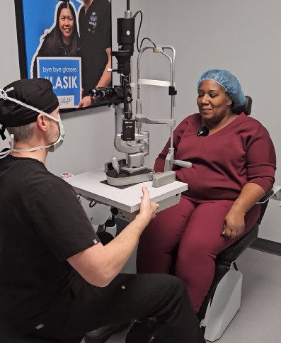 Patient undergoing a comprehensive eye exam as part of a LASIK preoperative evaluation